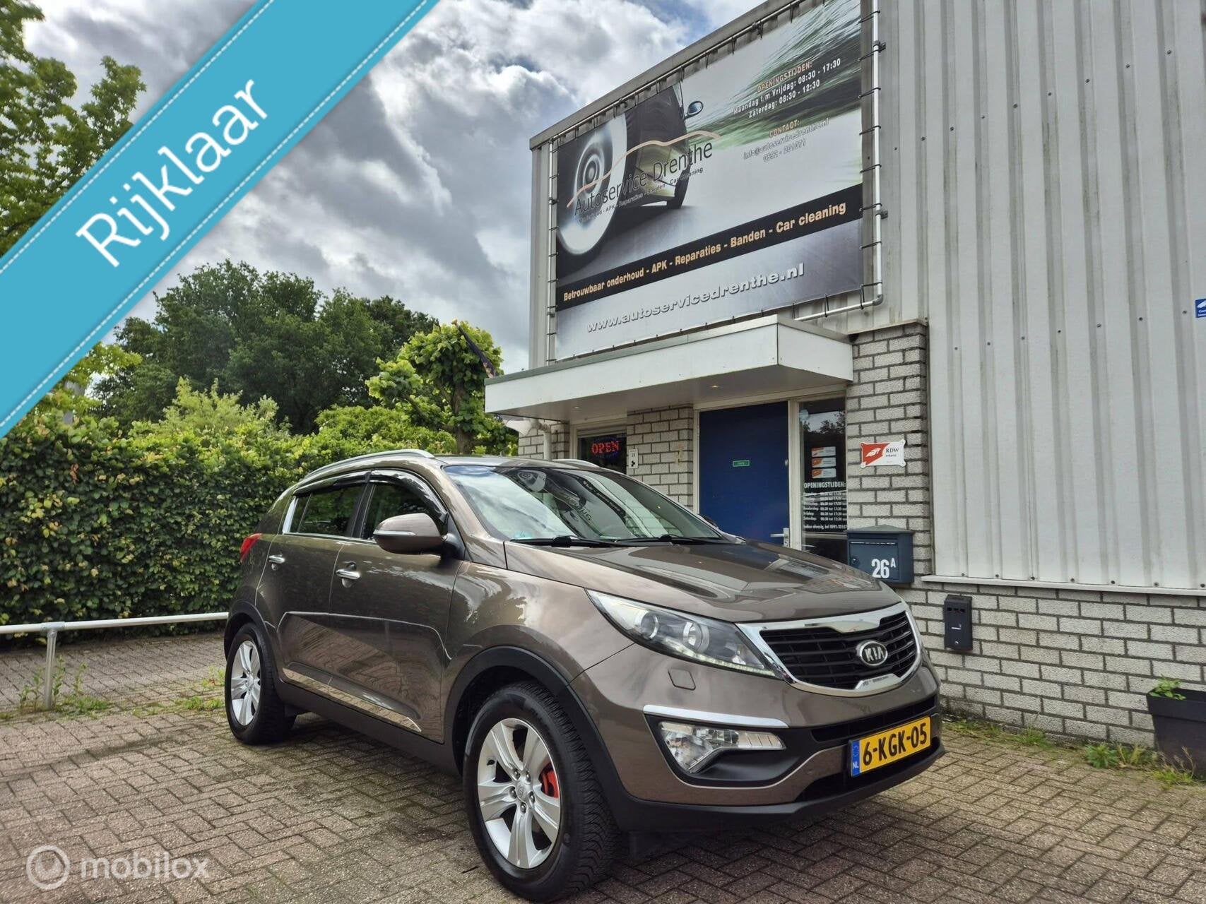 Kia Sportage 2.0 X-tra Carplay/PDC/Airco/Trekhaak/Automaat!, Auto's, Gebruikt, 4 cilinders, Bruin, 163 pk