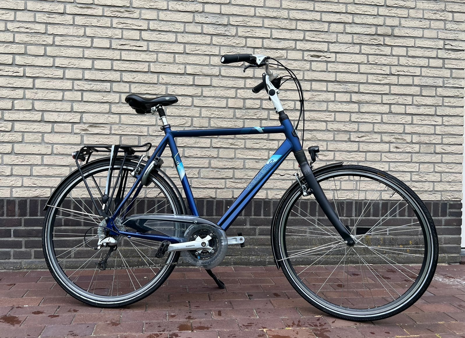 Blauwe Gazelle heren fiets, Ophalen, Gebruikt, Velgrem, Versnellingen