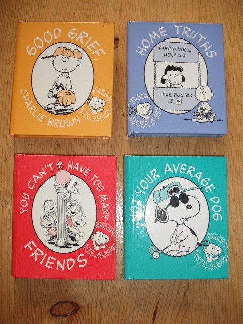 Snoopy Peanuts klein foto album boekjes foto's strip strips, Verzamelen, Stripfiguren, Verzenden, Snoopy, Zo goed als nieuw, Overige typen