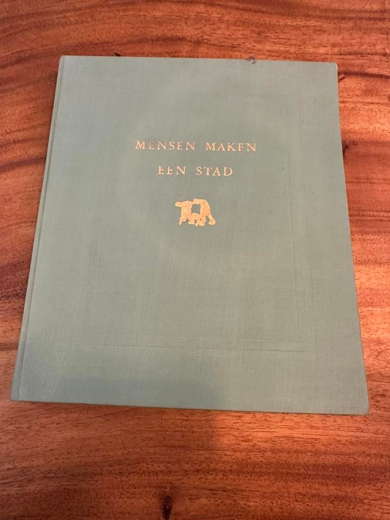 Mensen maken een stad, Boeken, Ophalen of Verzenden, 20e eeuw of later, Gelezen
