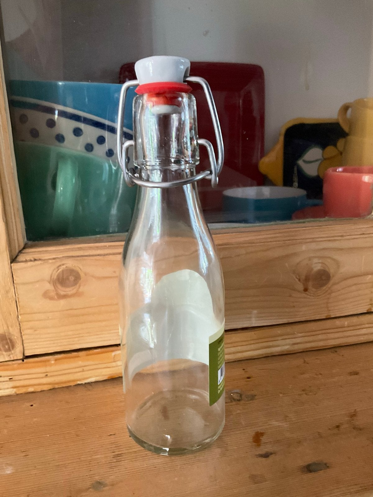 Wie zoekt een kleine glazen  beugelfles., Ophalen, Zo goed als nieuw