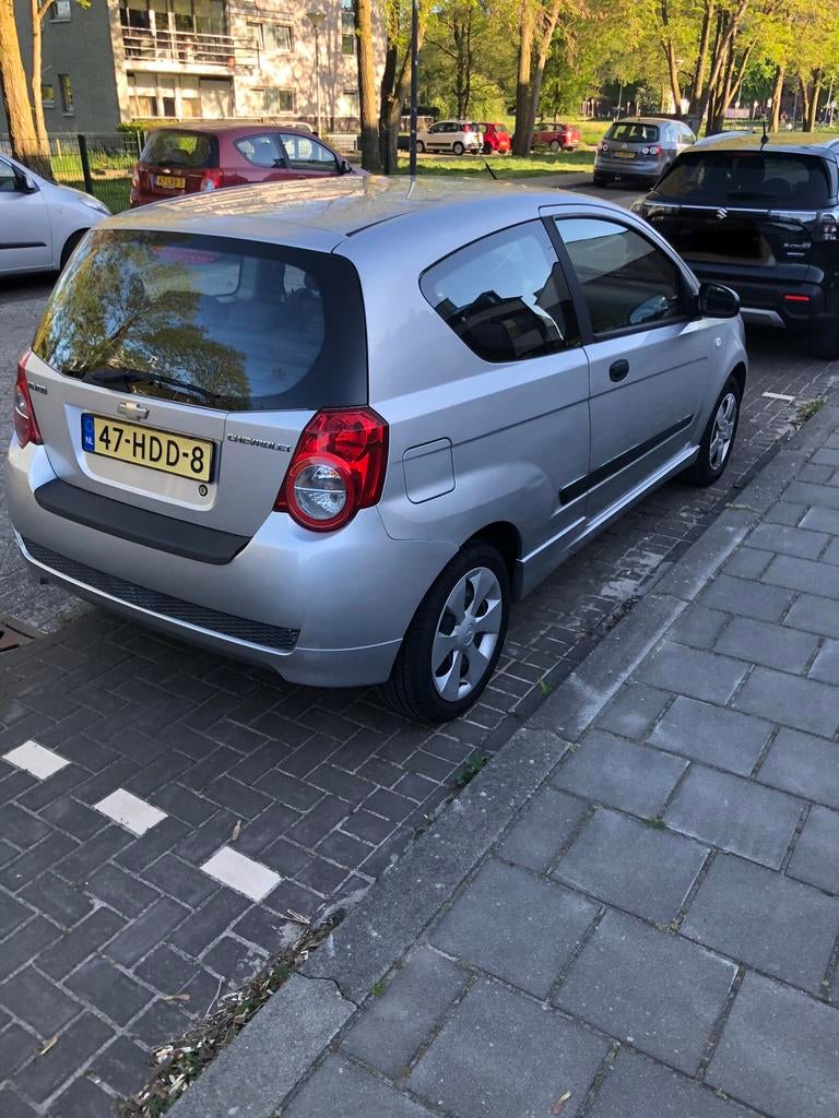 Chevrolet Aveo 1.2 16V 3D 2008 Grijs, Auto's, Chevrolet, Voorwielaandrijving, 40 €/maand, Aveo, 4 cilinders