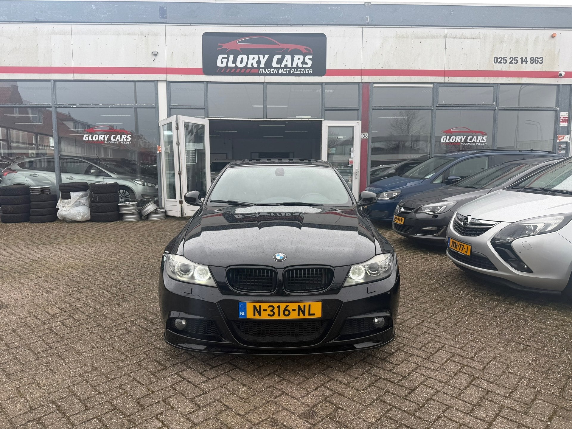 BMW 3-serie 335i AUTOMAAT-LEER-PDC-NAVI-CRUISE, Euro 5, Achterwielaandrijving, Zwart, Leder