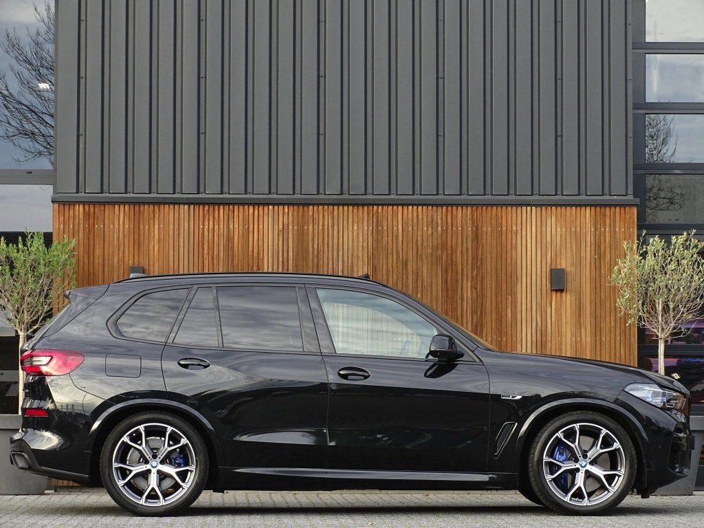 BMW X5 45e X-drive 394PK / M-Sport Pro / Individual / B & W, Automaat, Gebruikt, Met garantie (alle), Zwart
