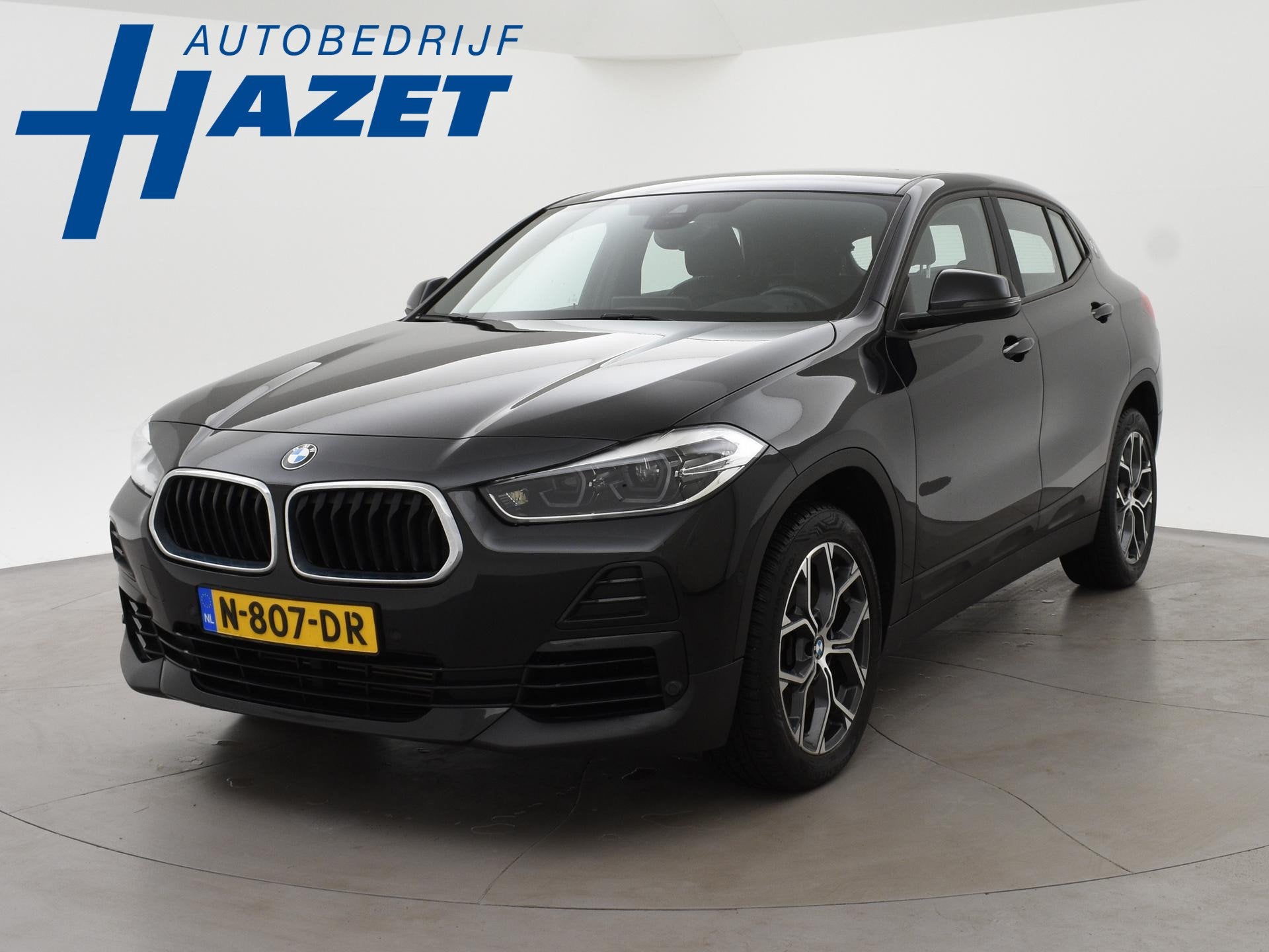 BMW X2 sDrive20i 178 PK AUT. HIGH EXECUTIVE EDITION + TREKHA, Auto's, 1998 cc, X2, 4 cilinders, Zwart