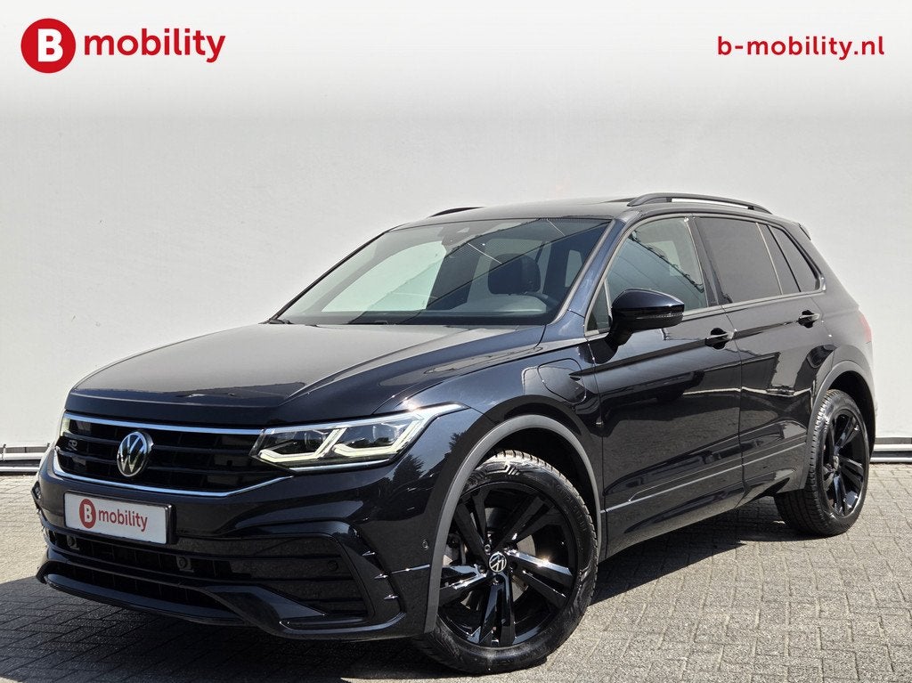 Volkswagen Tiguan 1.4 TSI eHybrid R-Line Trekhaak 1800kg Pan, Auto's, Volkswagen, 4 cilinders, Leder en Stof, Zwart, Hybride Elektrisch/Benzine