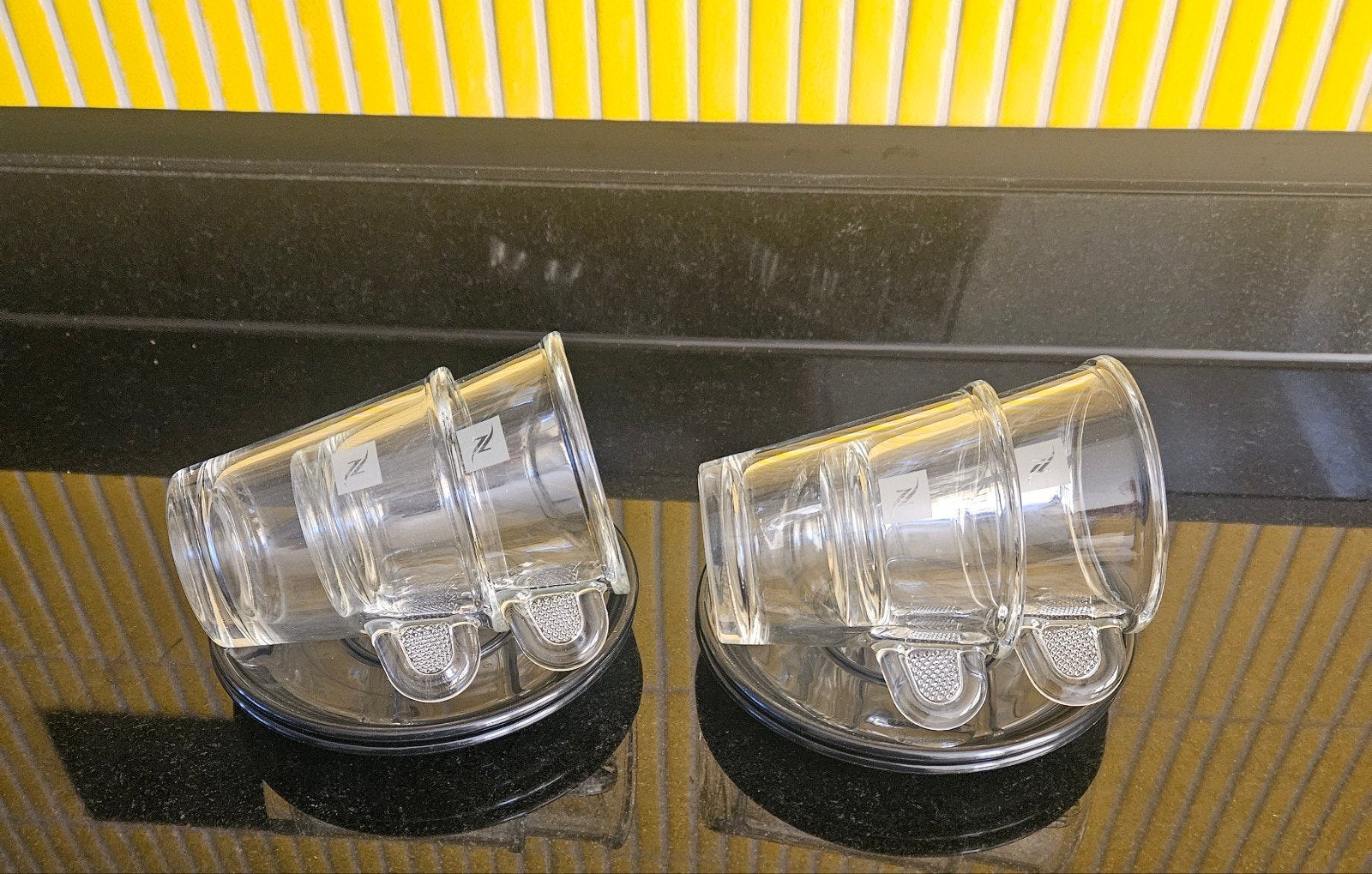 4 Nespresso kopjes en schotels, Huis en Inrichting, Ophalen of Verzenden