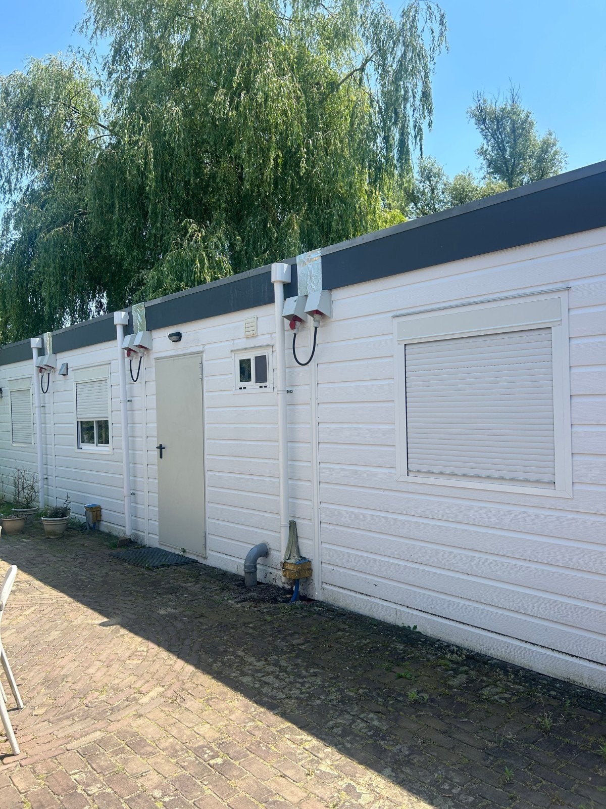 Woonunit 6,5 x 12 meter te huur staat nu bij nijmegen, Ophalen
