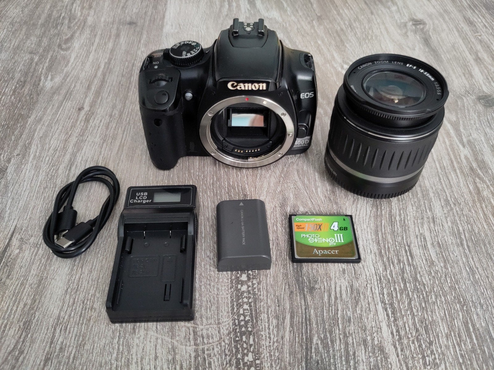 Canon EOS 400D met 18-55mm lens, accu en lader, Ophalen of Verzenden, Spiegelreflex, Canon