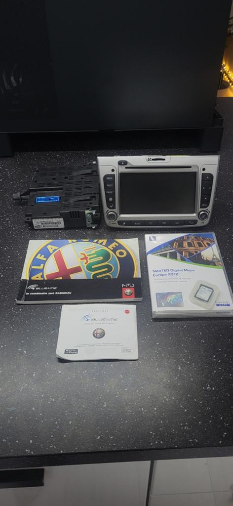 Alfa Romeo Mito Navigatie Systeem + Blue&Me Module + bracket, Ophalen of Verzenden, Gebruikt, Alfa Romeo