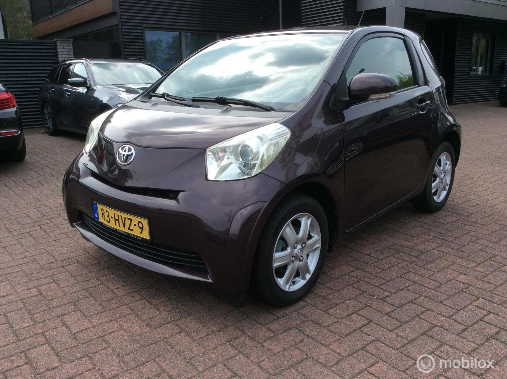 Toyota iQ 1.0 VVTi Comfort Airco word niet koud lm vlg Nap 4, Gebruikt, Overige kleuren, 4 stoelen, Leder en Stof