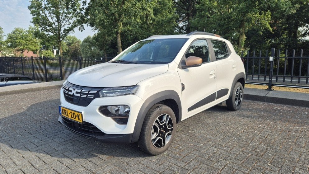 Dacia Spring Extreme 27 kWh | Camera | Navi | PDC | Lichtmet, Auto's, Dacia, Stof, Gebruikt, Huisgarantie, Met garantie (alle)