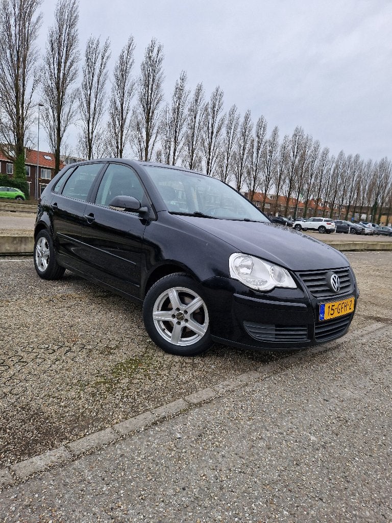 Volkswagen Polo 1.4 16V Comfortline | Airco | Cruise Control, Auto's, Volkswagen, Voorwielaandrijving, Stof, 40 €/maand, Zwart