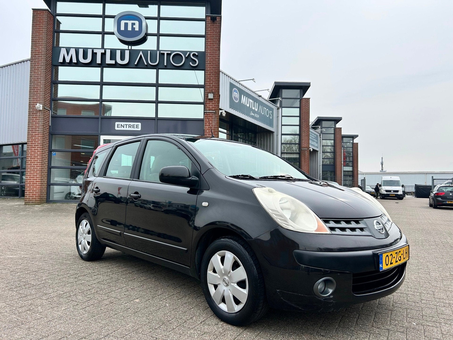 Nissan Note 1.4 Visia 5deurs Airco NAP APK, Auto's, Nissan, Voorwielaandrijving, 4 cilinders, Zwart, Origineel Nederlands