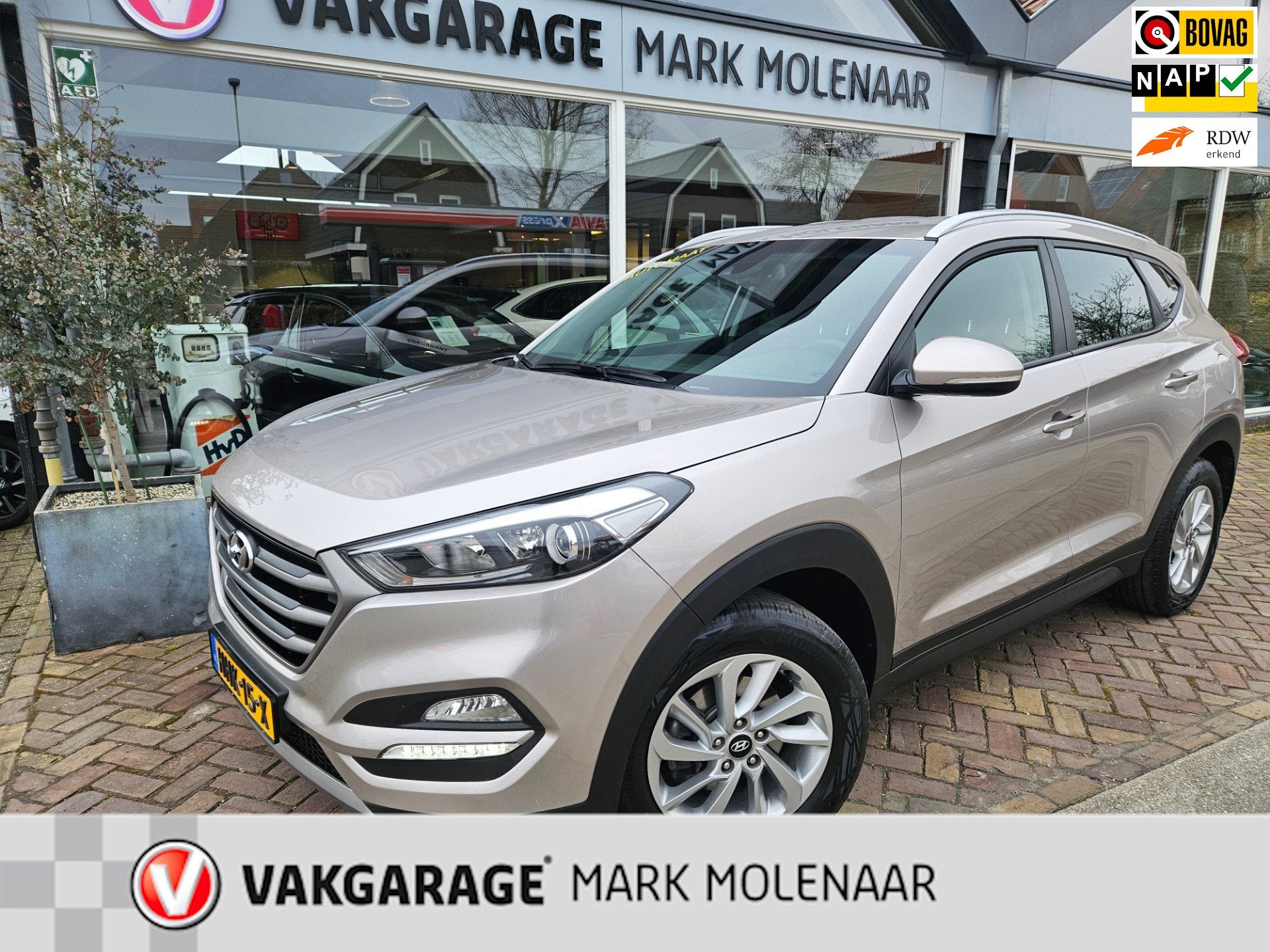 Hyundai TUCSON 1.6 T-GDi i-Motion 4WD,full optionsautomaat, Auto's, Gebruikt, 4 cilinders, Bruin, Bedrijf