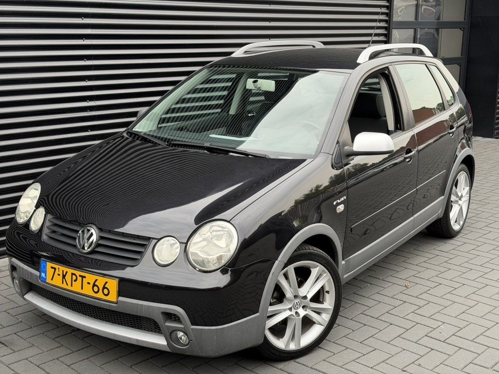 Volkswagen Polo 1.2-12V FUN| CROSS| AIRCO| 17"LM| STOELVERW|, Auto's, Volkswagen, Stof, 1064 kg, 1198 cc, Zwart