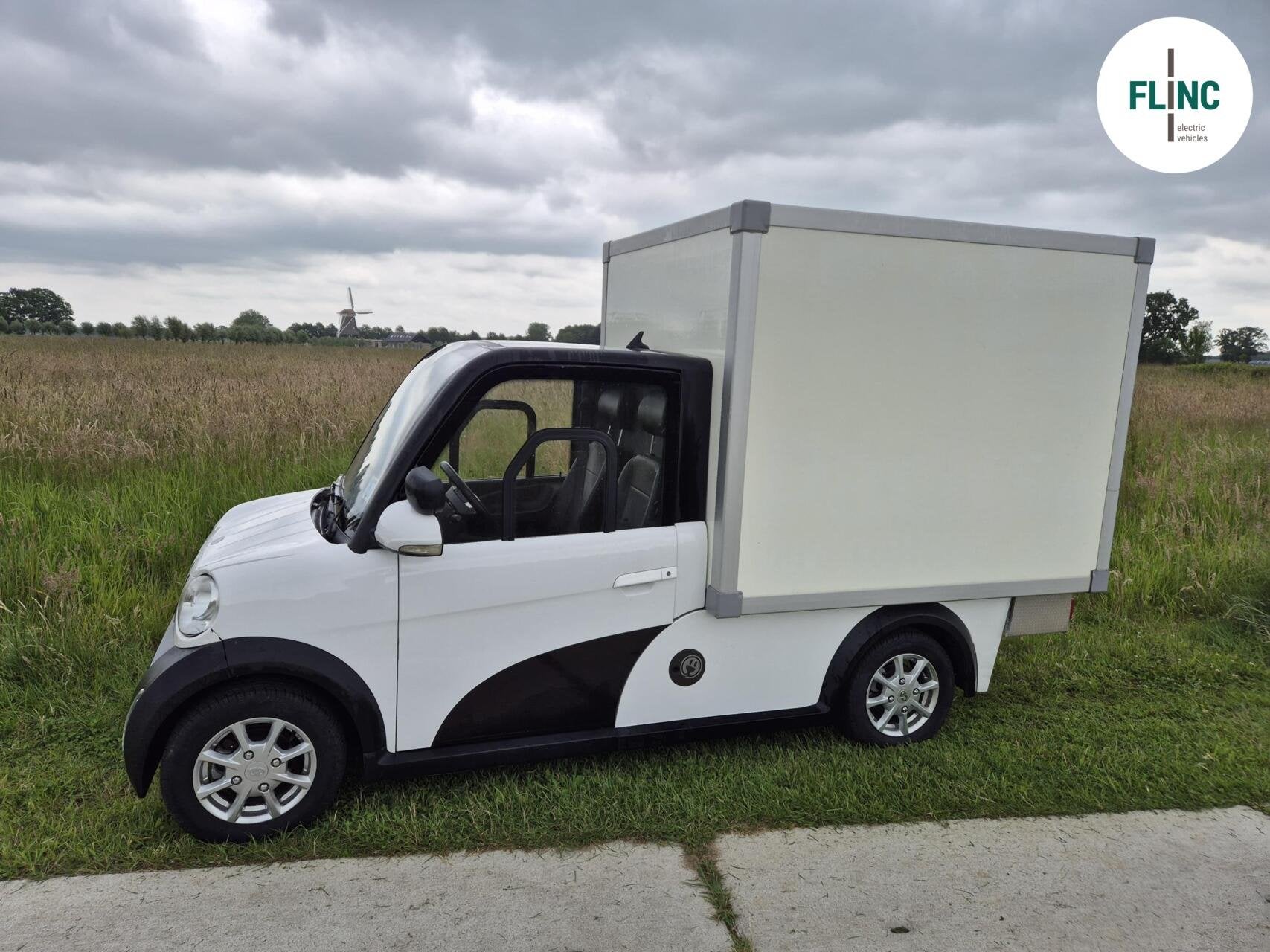 Flinc Cargo XC+ gesloten XXL laadbak, Stadsdistributie, Auto's, Automaat, Achterwielaandrijving, Gebruikt, Zwart