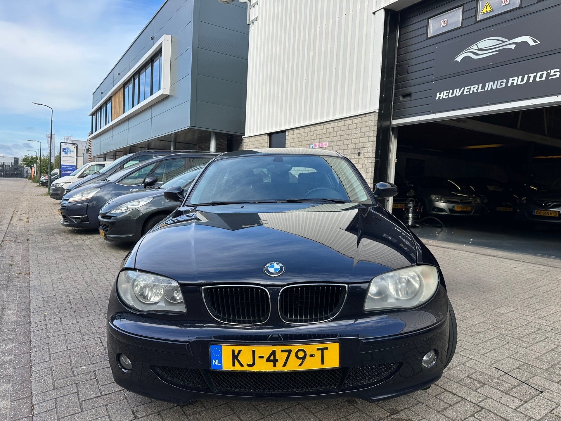 BMW 1-serie 116i | Airco | Stoelverwarming | 5 DRS, Auto's, 1596 cc, Gebruikt, Zwart, 4 cilinders