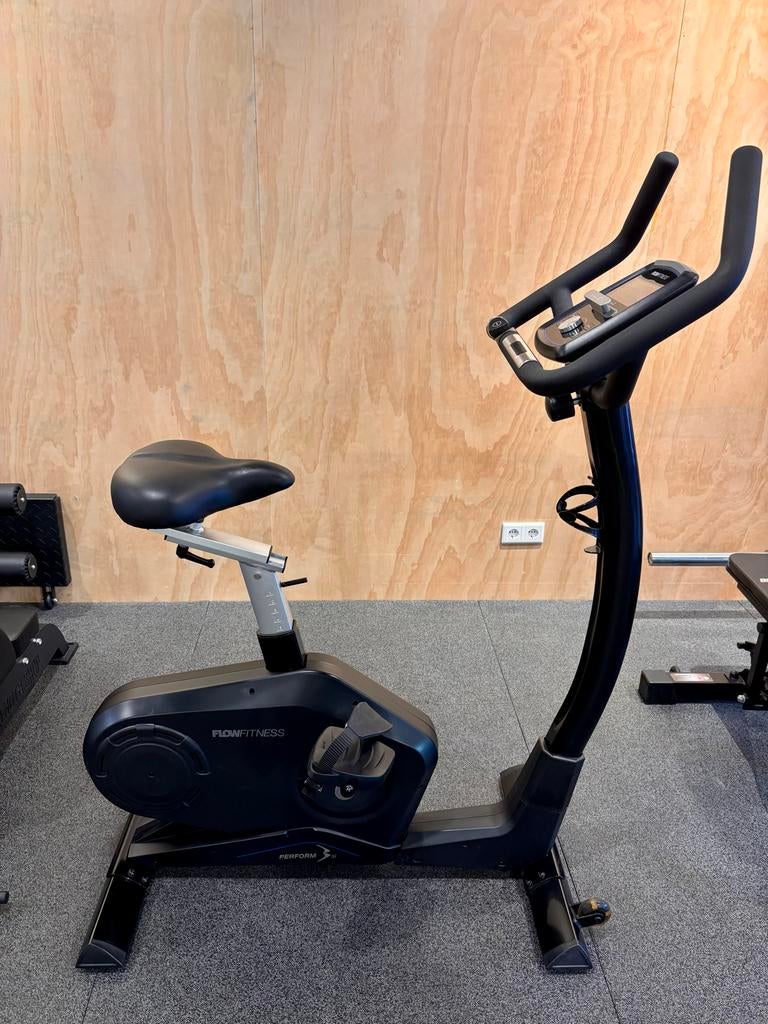 Flow Fitness Perform B3i Hometrainer - Bluetooth & Kinomap, Ophalen, Zo goed als nieuw, Metaal, Benen