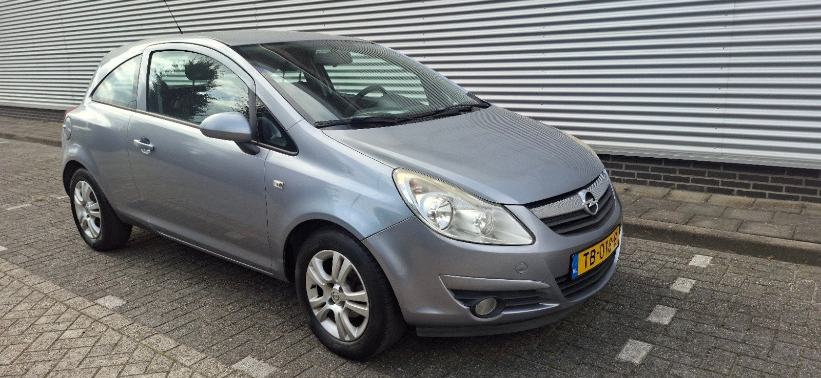 Opel Corsa 1.2 16V 3D WR 2009 Grijs