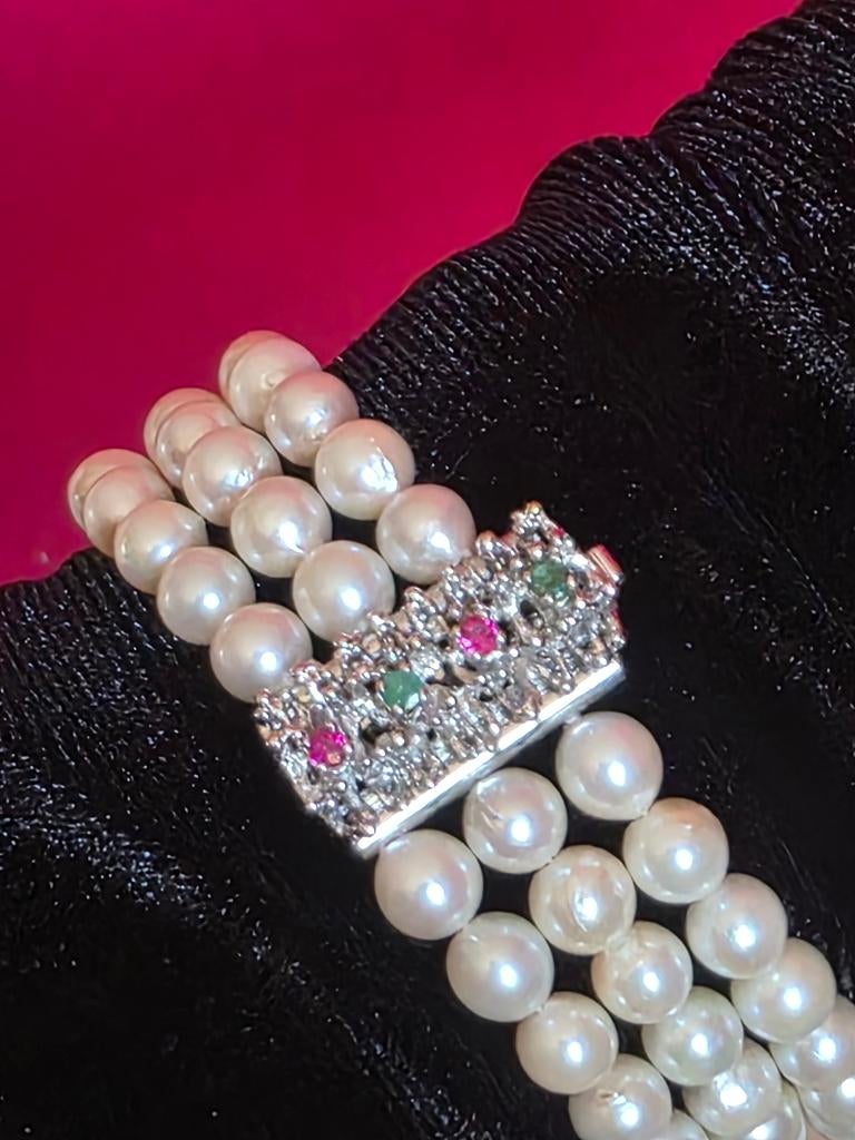 Parels armband met gouden slot, smaragden en robijnen, Ophalen of Verzenden, Zo goed als nieuw, Met edelsteen, Goud