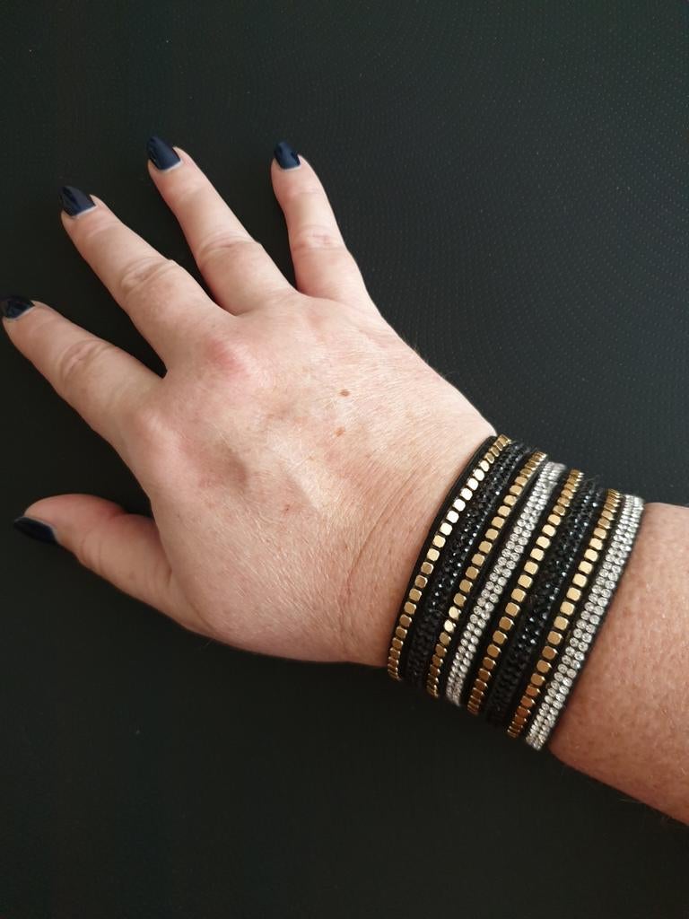 Verstelbare armband. Zwart, goud, strassteentjes. Zgan., Ophalen of Verzenden, Nieuw, Zwart, Met strass