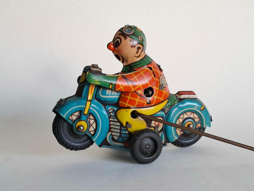 Huki blikken motorfiets met clown, Ophalen of Verzenden