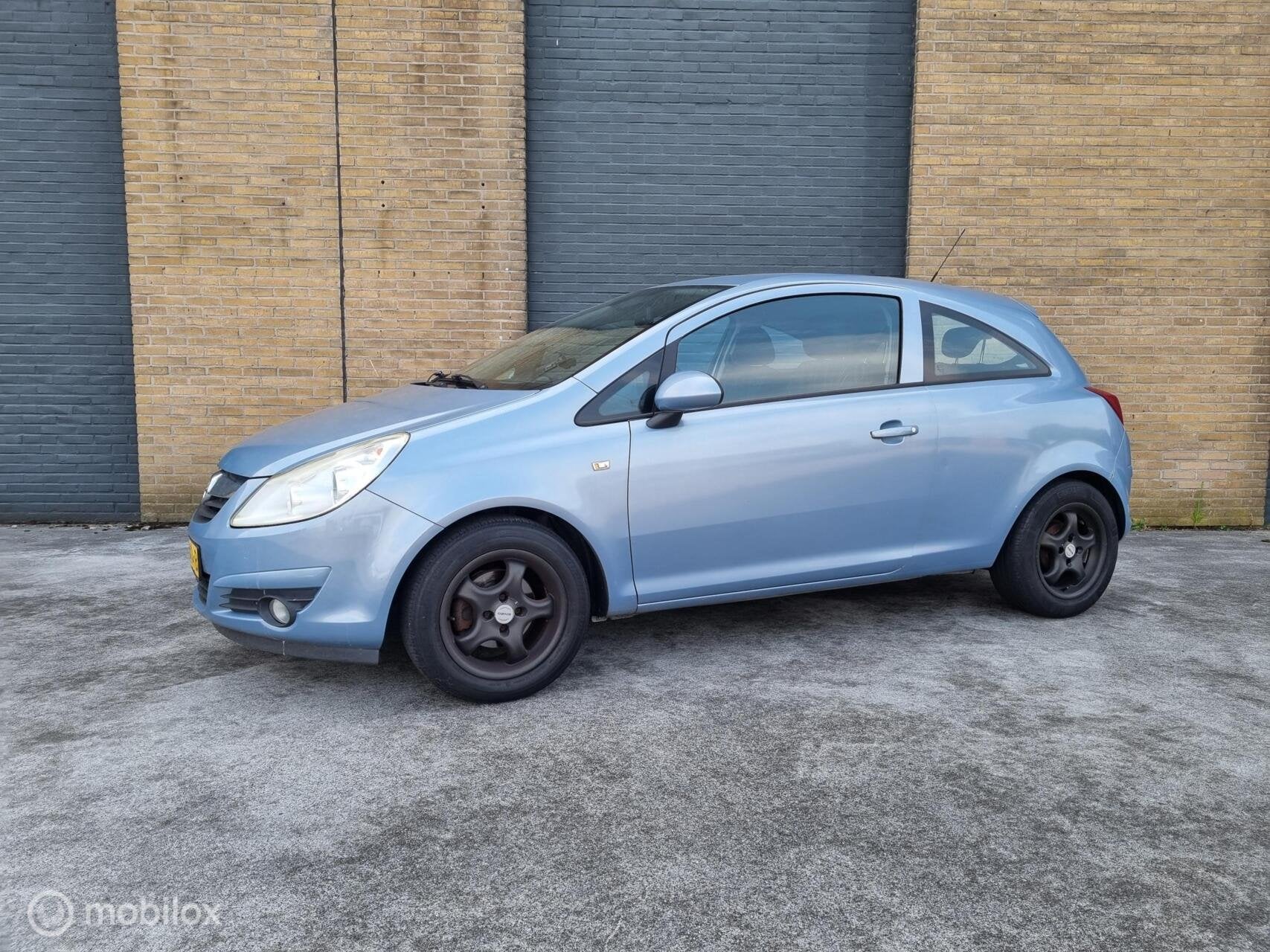 Opel Corsa 1.2-16V Cosmo airco lm velgen 2x sleutel, Auto's, Voorwielaandrijving, 450 kg, Blauw, 1229 cc