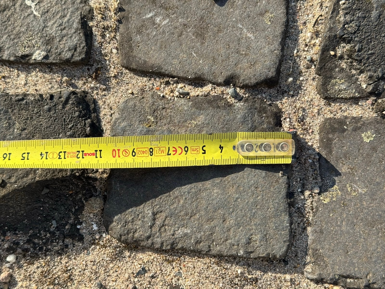 Kinderkoppen sierstraatwerk natuursteen ca 20m2, Ophalen