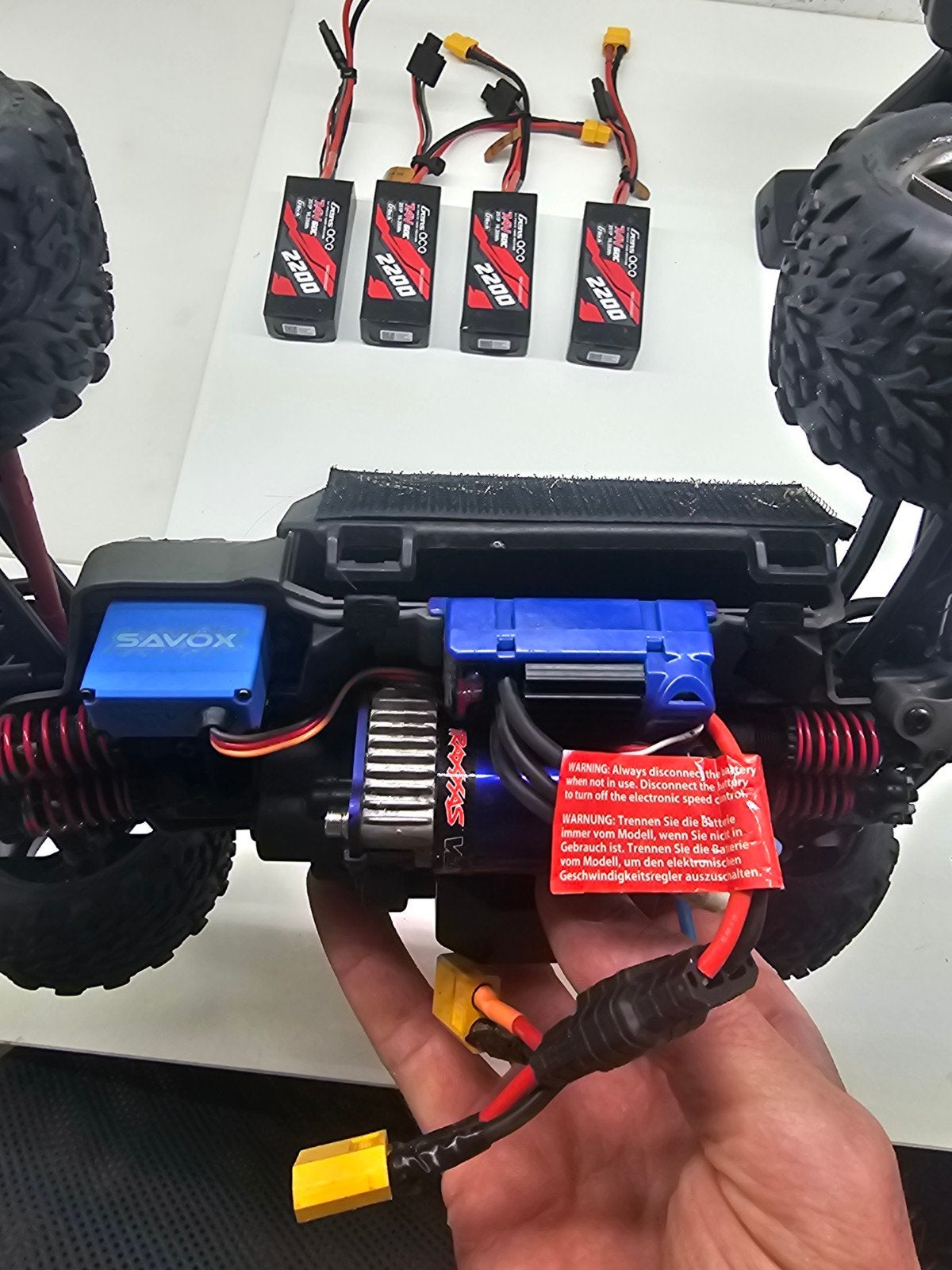 Traxxas e-revo 1/16 brushles met 4 accu's, Hobby en Vrije tijd, Elektro, Gebruikt, Auto offroad, Ophalen of Verzenden