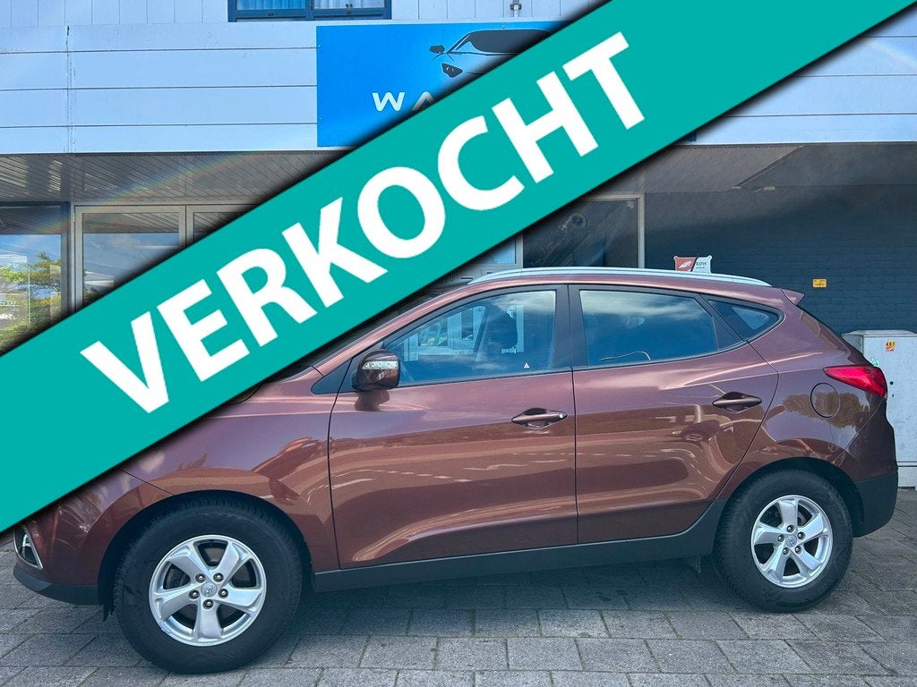 Hyundai Ix35 2.0i Business Edition NAVI/CLIMA/ Uniek! Lage k, Auto's, Hyundai, Gebruikt, Zwart, Leder en Stof, 1600 kg