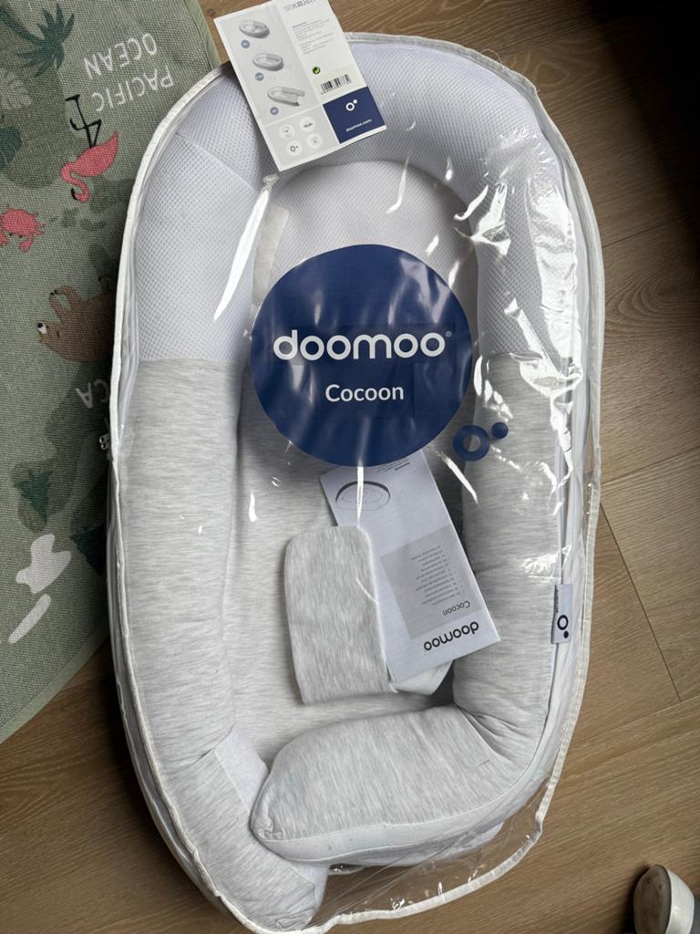 Doomoo Cocoon babynestje - Nieuw in verpakking, Kinderen en Baby's, Wipstoeltjes, Ophalen, Zo goed als nieuw