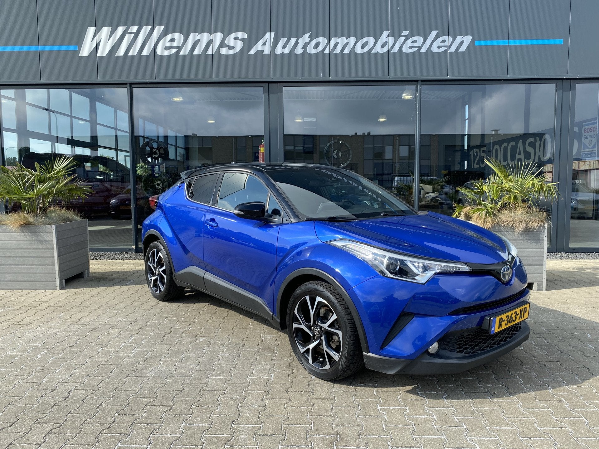 Toyota C-HR 1.8 Hybrid Bi-Tone Adaptive Cruise Control, Stoe, Auto's, 4 cilinders, Met garantie (alle), Blauw, 26 km/l