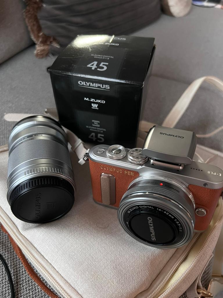 Olympus pen camera bruin met 3 verschillende lenzen., Audio, Tv en Foto, Fotocamera's Analoog, Ophalen of Verzenden, Zo goed als nieuw