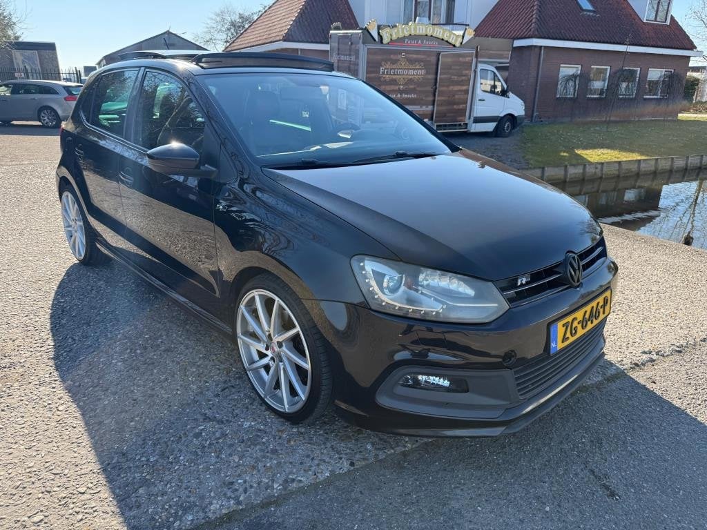Volkswagen Polo 1.2 TSI Highline AUTOMAAT, pops & bangs, Euro 5, 4 cilinders, Alcantara, Zwart