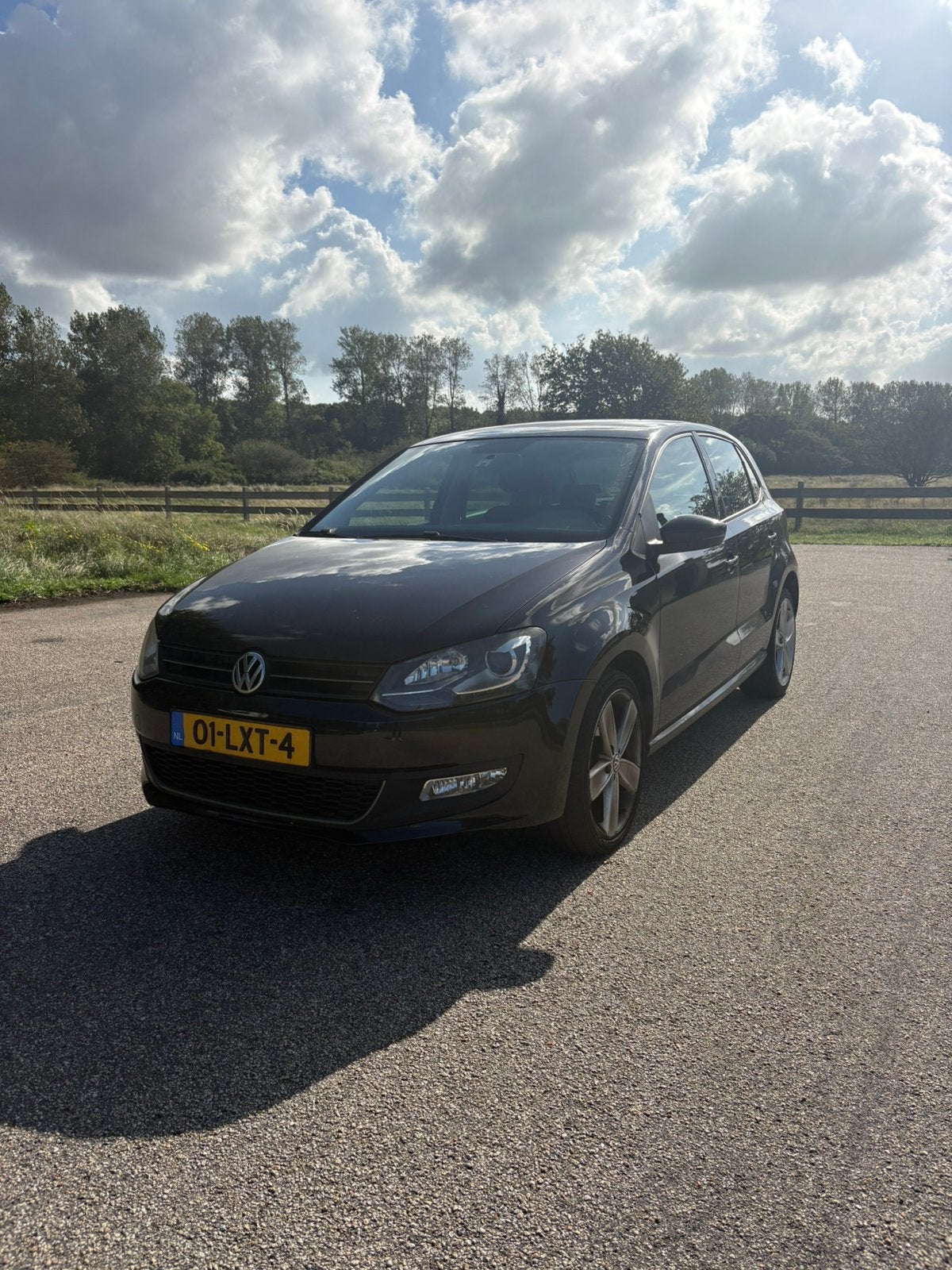 Volkswagen Polo 1.4 16V FSI 63KW 2010 Zwart, Auto's, Voorwielaandrijving, 970 kg, 40 €/maand, Zwart