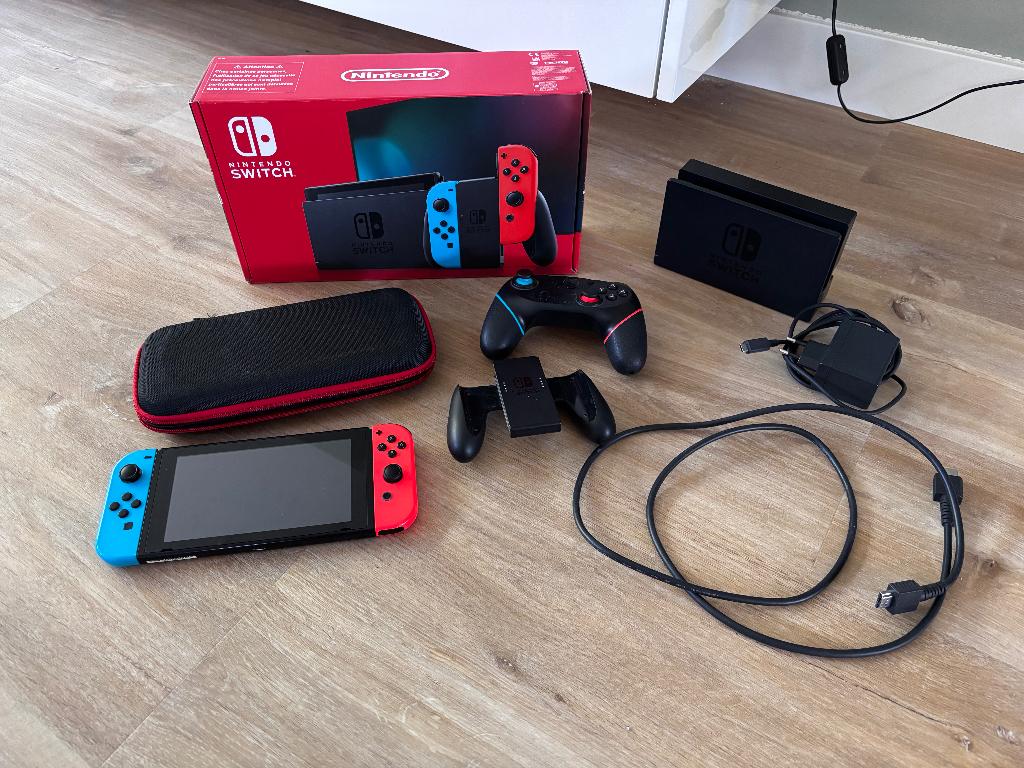 Nintendo Switch met doos, extra controller en beschermhoes, Spelcomputers en Games, Spelcomputers | Nintendo Switch, Ophalen of Verzenden