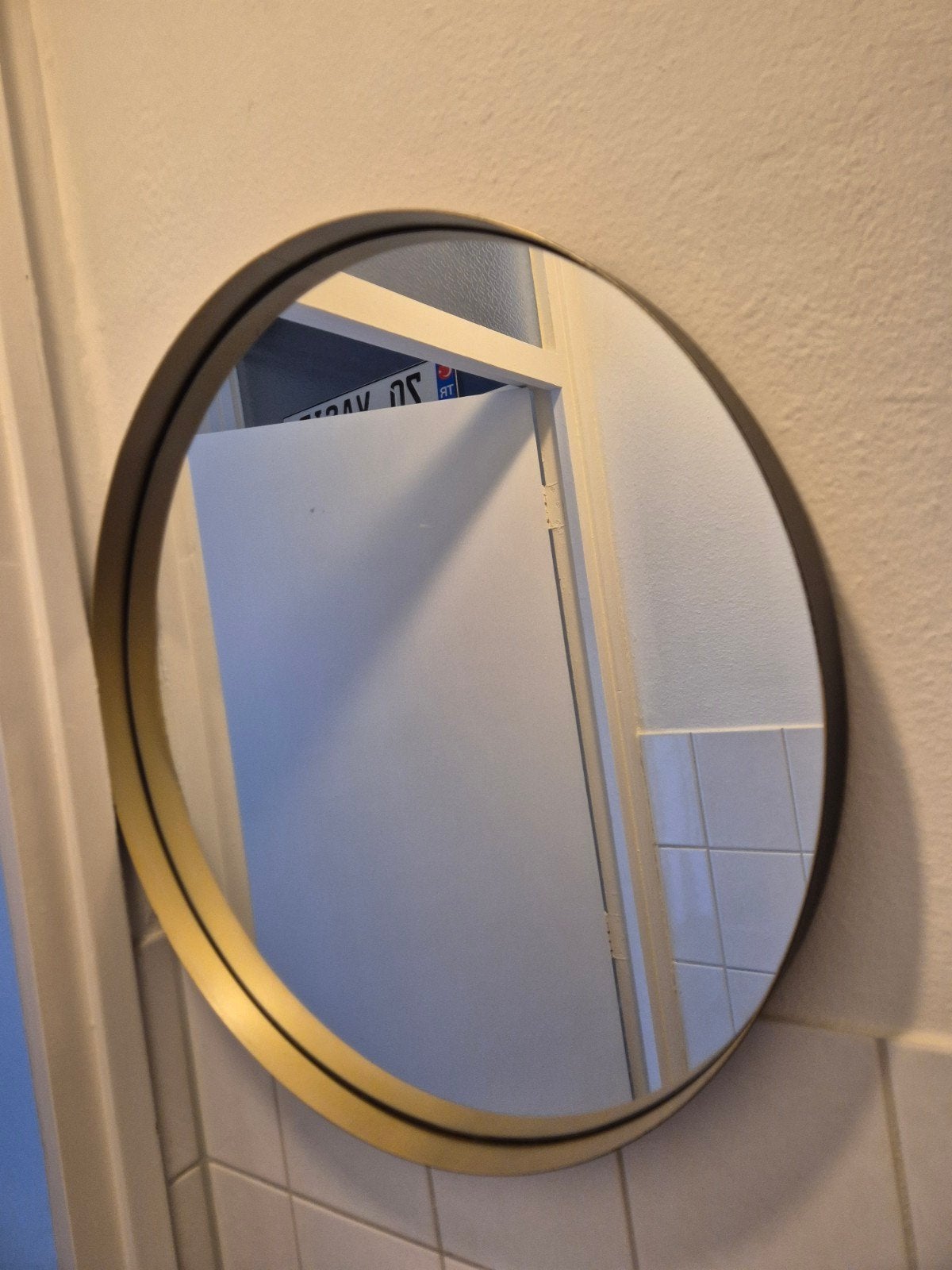Ronde spiegel 60cm met klein vlekje, Huis en Inrichting, Woonaccessoires | Spiegels, Ophalen of Verzenden, Rond, 50 tot 75 cm