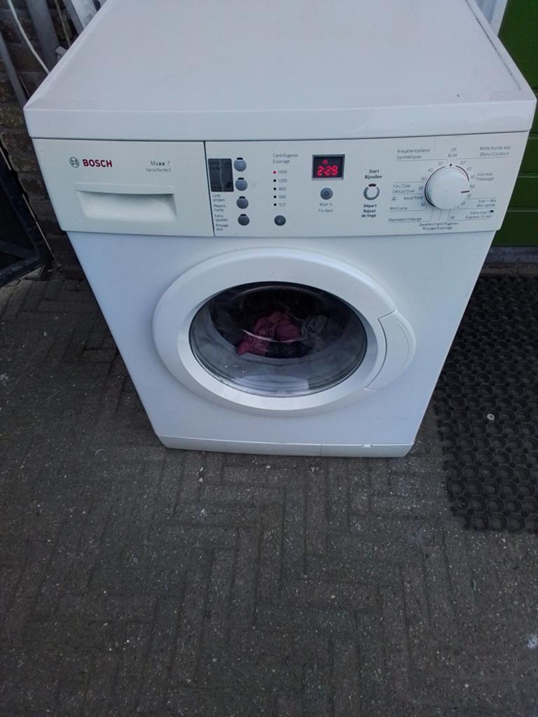 Bosch wasmachine 7 kilo 1400 toeren, Ophalen, Gebruikt, Voorlader, 85 tot 90 cm