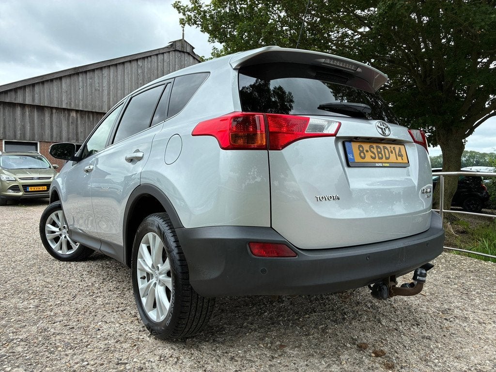 Toyota RAV4 2.0 Executive Business 4WD | Leder + Cruise + Cl, Auto's, Toyota, Gebruikt, Zwart, 4 cilinders, 2000 kg