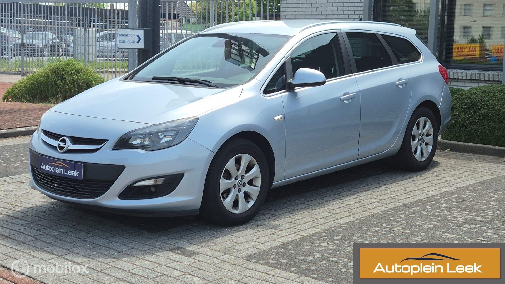 Opel Astra Sports Tourer 1.4 Turbo Edition trekhaak clima, Auto's, Opel, Voorwielaandrijving, Gebruikt, Euro 6, Origineel Nederlands