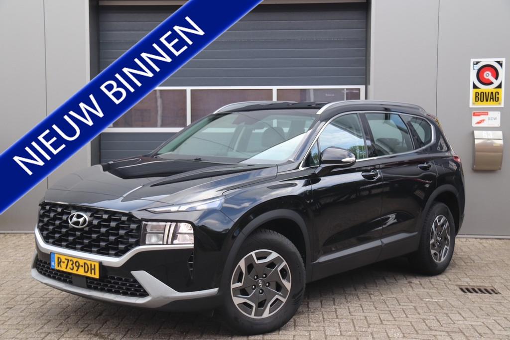 Hyundai Santa Fe 1.6 T-GDI HEV i-Motion, Trekhaak, Camera, S, Auto's, Hyundai, 4 cilinders, 1650 kg, Zwart, Origineel Nederlands