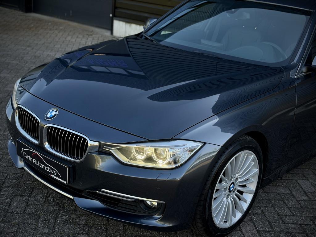 BMW 3-serie 320i LuxuryL AUT|DAK|LEER|MEMORY|NAVIPRO|LED, Auto's, Automaat, Euro 5, Gebruikt, Zwart