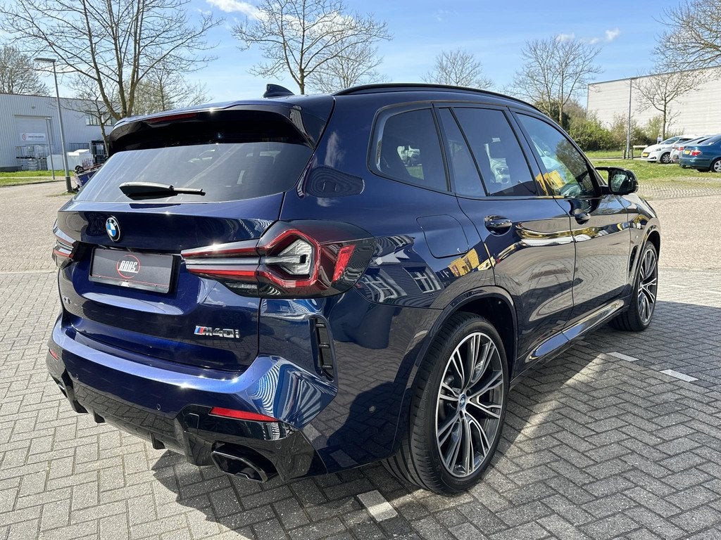 BMW X3 M40i xDrive High Executive 360pk | Individual | M spo, Auto's, BMW, Automaat, Gebruikt, 1885 kg, Blauw