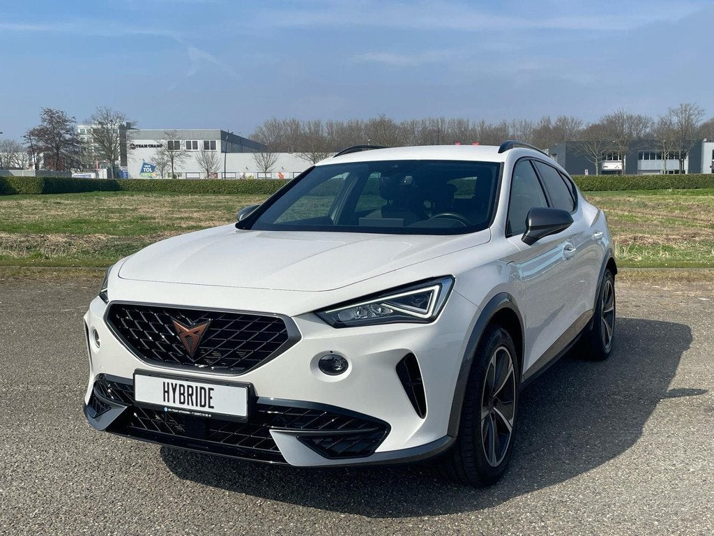 Cupra Formentor 1.4 TSI e-Hybrid Essential 18 inch velgen, S, Auto's, Cupra, Stof, Gebruikt, 4 cilinders, Wit