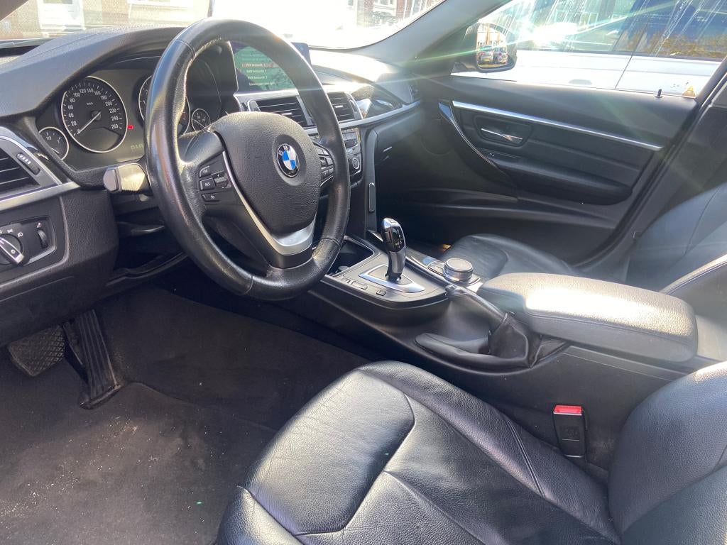 BMW 3-Serie 320ia Touring 184pk high Executive December 2017, Auto's, 1998 cc, Achterwielaandrijving, 1800 kg, Zwart