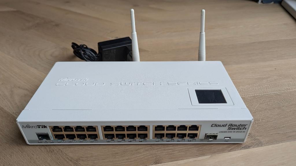 MikroTik Routerboard CRS125-24G-1S-2HnD-IN Cloud Router, Ophalen of Verzenden, Gebruikt, Router, Mikrotik