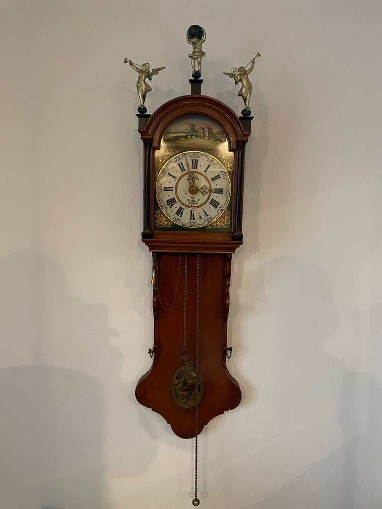 Antieke friese staartklok, Ophalen