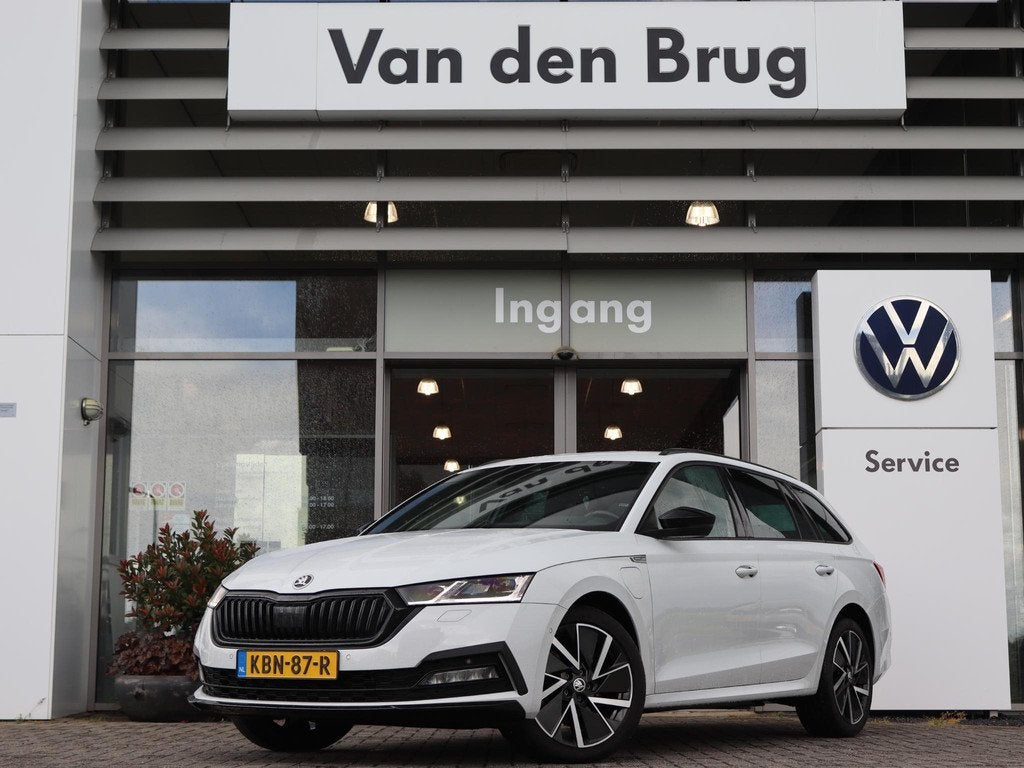 Skoda Octavia Combi 1.4 TSI 204 pk DSG iV PHEV Sportline Bus, Auto's, 1556 kg, Stof, Gebruikt, Euro 6
