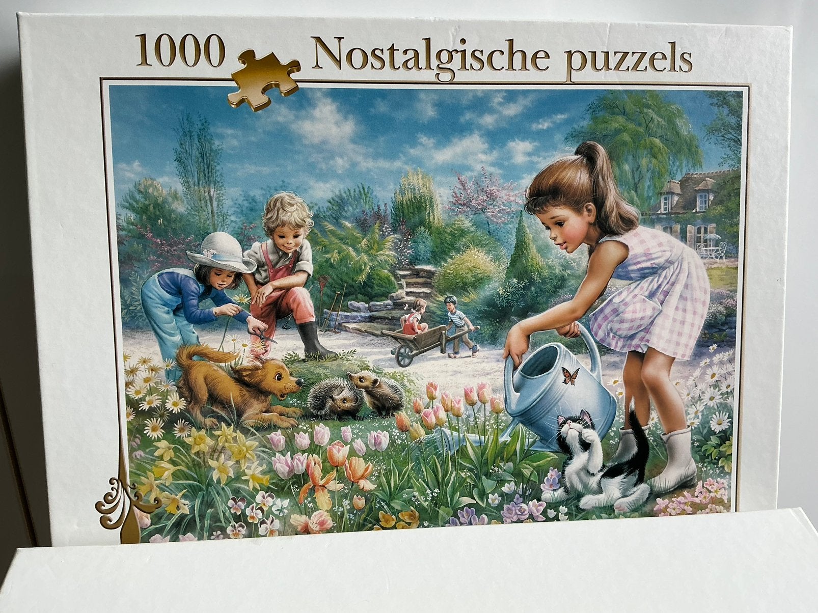 Nostalgische Puzzel Tuinidylle lief kinderen egels poes hond, Ophalen of Verzenden, 500 t/m 1500 stukjes, Zo goed als nieuw, Legpuzzel